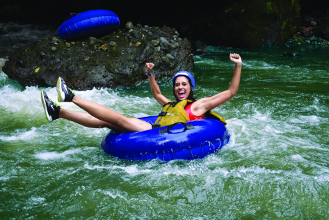 girl tubing in pejivalle whitewater park
